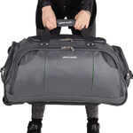 Person holding a gray duffel bag with 'Pierre Cardin' branding on a white background