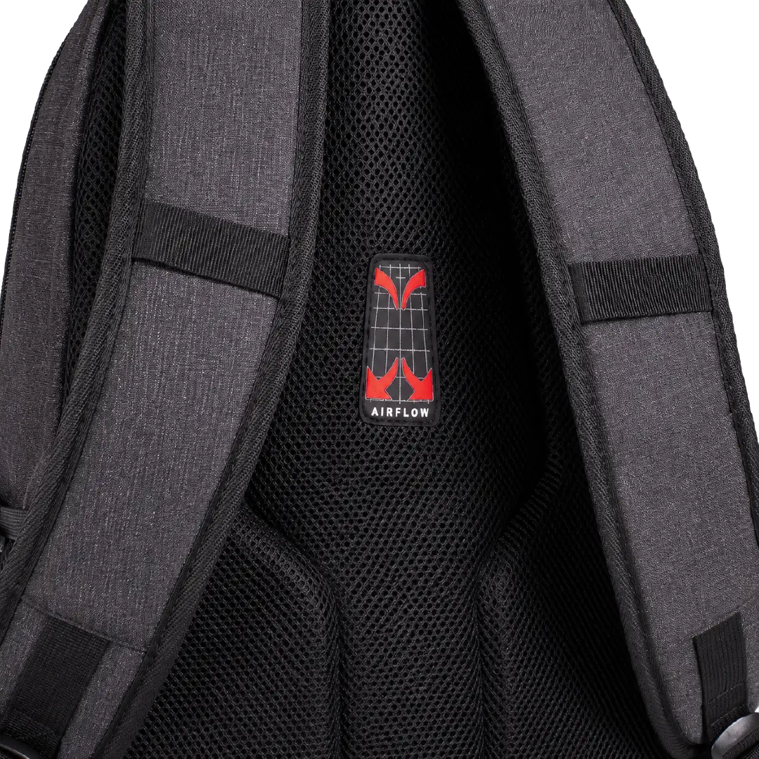 Close-up of the back padding of a dark gray backpack, showing the AIRFLOW mesh technology with a red and black logo patch in the center.