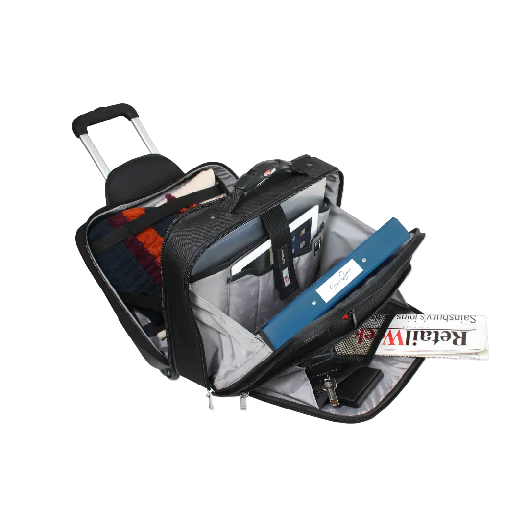 A black rolling laptop backpack with its telescoping handle extended, shown open on a white background to display its interior compartments, organizer pockets, and packed contents including a blue binder and a notebook.