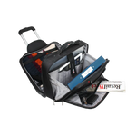 A black rolling laptop backpack with its telescoping handle extended, shown open on a white background to display its interior compartments, organizer pockets, and packed contents including a blue binder and a notebook.