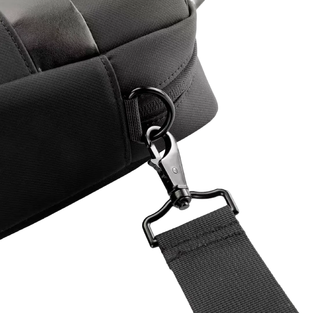 Close-up of a black fabric bag with a black webbed strap attached via a black metal swivel clasp and D-ring, shown on a white background.