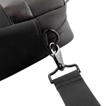 Close-up of a black fabric bag with a black webbed strap attached via a black metal swivel clasp and D-ring, shown on a white background.