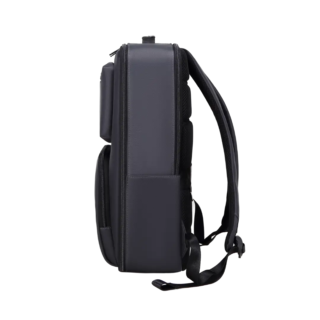 A dark navy blue backpack shown from the side profile against a solid white background.