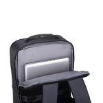 A black backpack shown open on a white background, with a silver laptop tucked into a padded gray compartment inside.