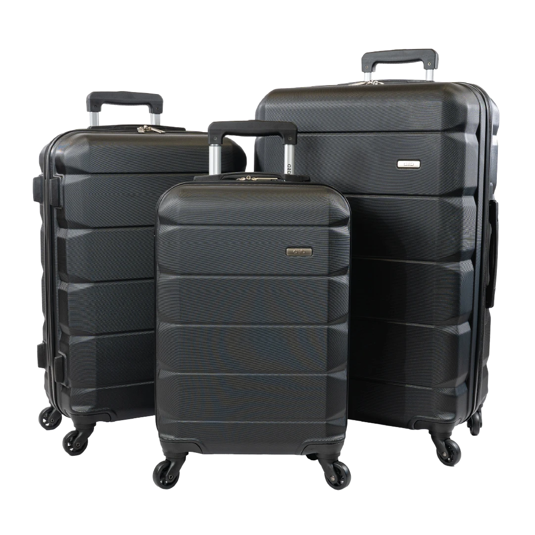 Three-piece black hardshell spinner luggage set with black trim and handles, shown on a plain white background.