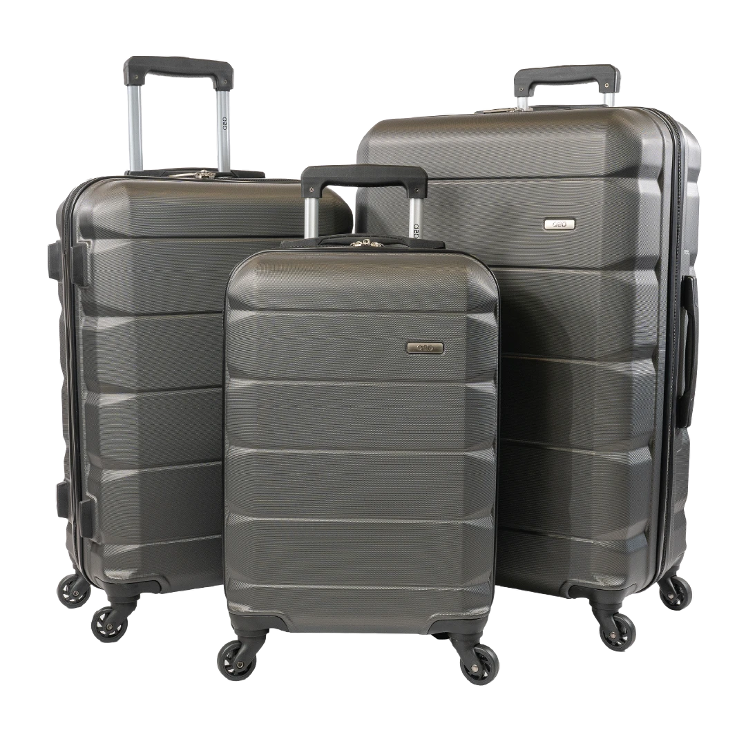 Three-piece grey hardshell spinner luggage set with black trim and handles, shown on a plain white background.
