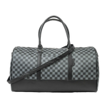 Checkered duffel bag with black accents on a white background