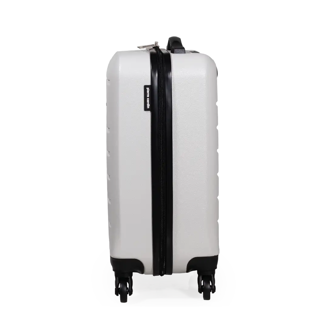 White suitcase with black accents on a white background