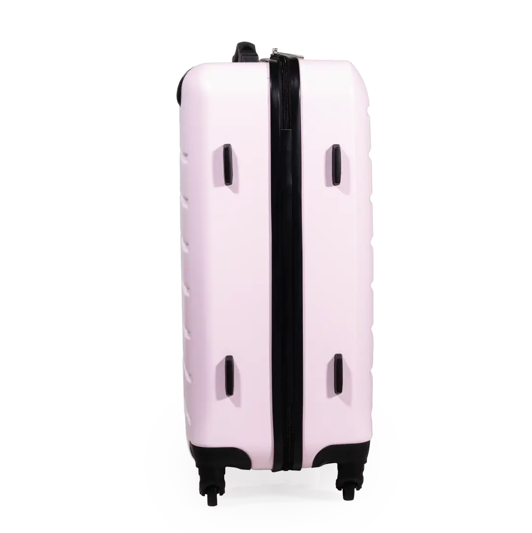 Pink suitcase with black accents on a white background