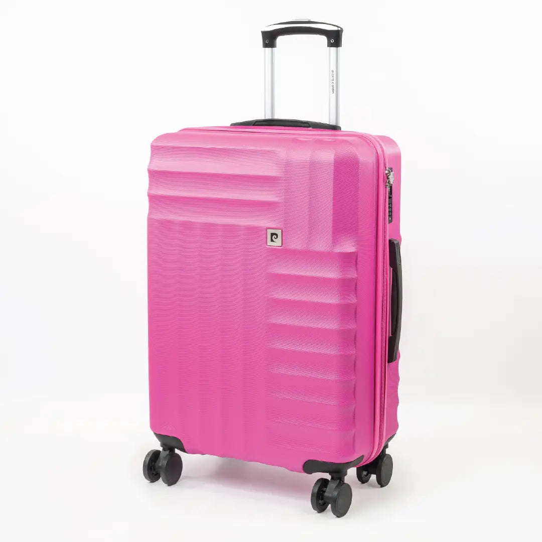 Pink suitcase with wheels and handle on a white background