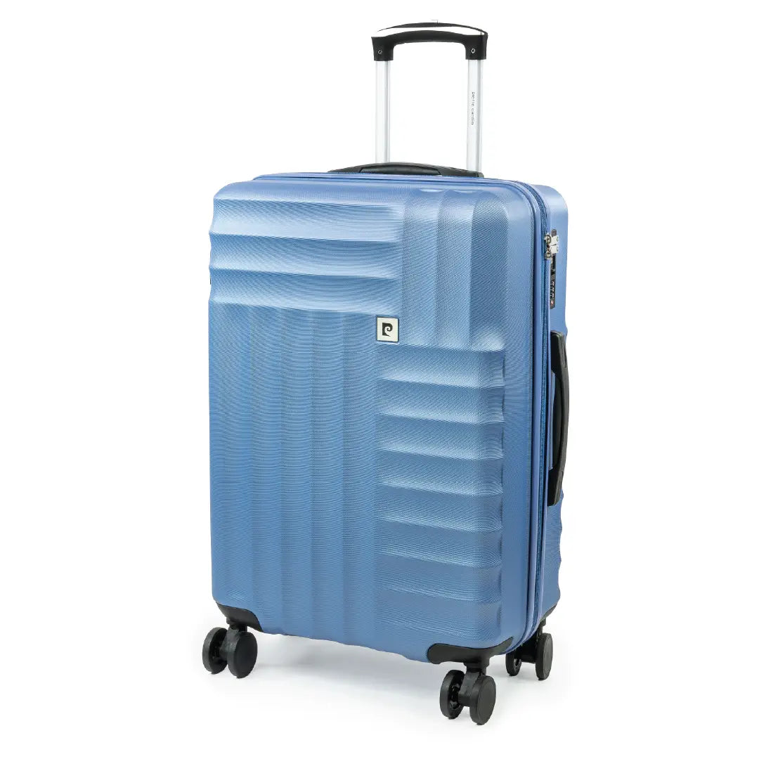 Blue suitcase with a textured surface on a white background