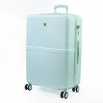 Light green suitcase with a textured surface on a white background