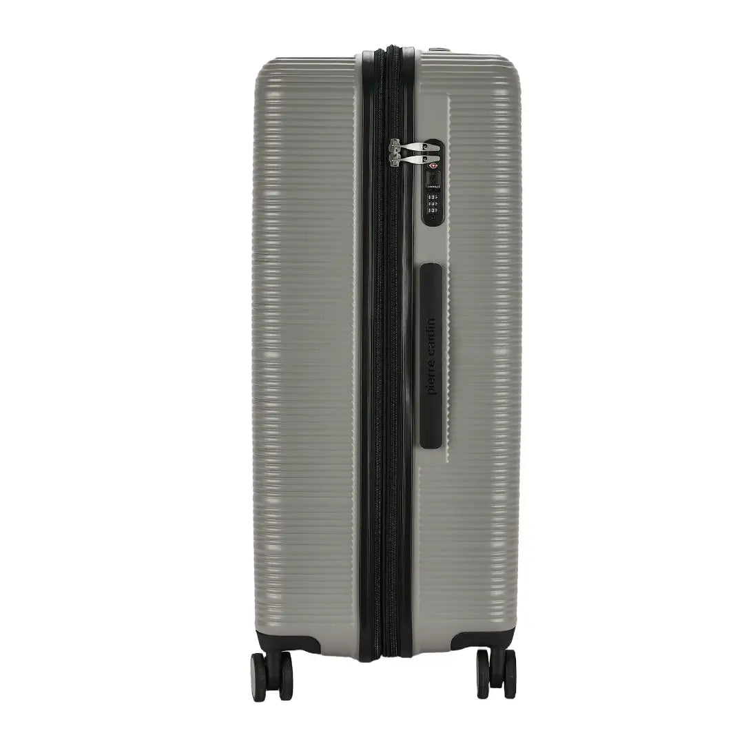 Silver suitcase with black handle and wheels on a white background