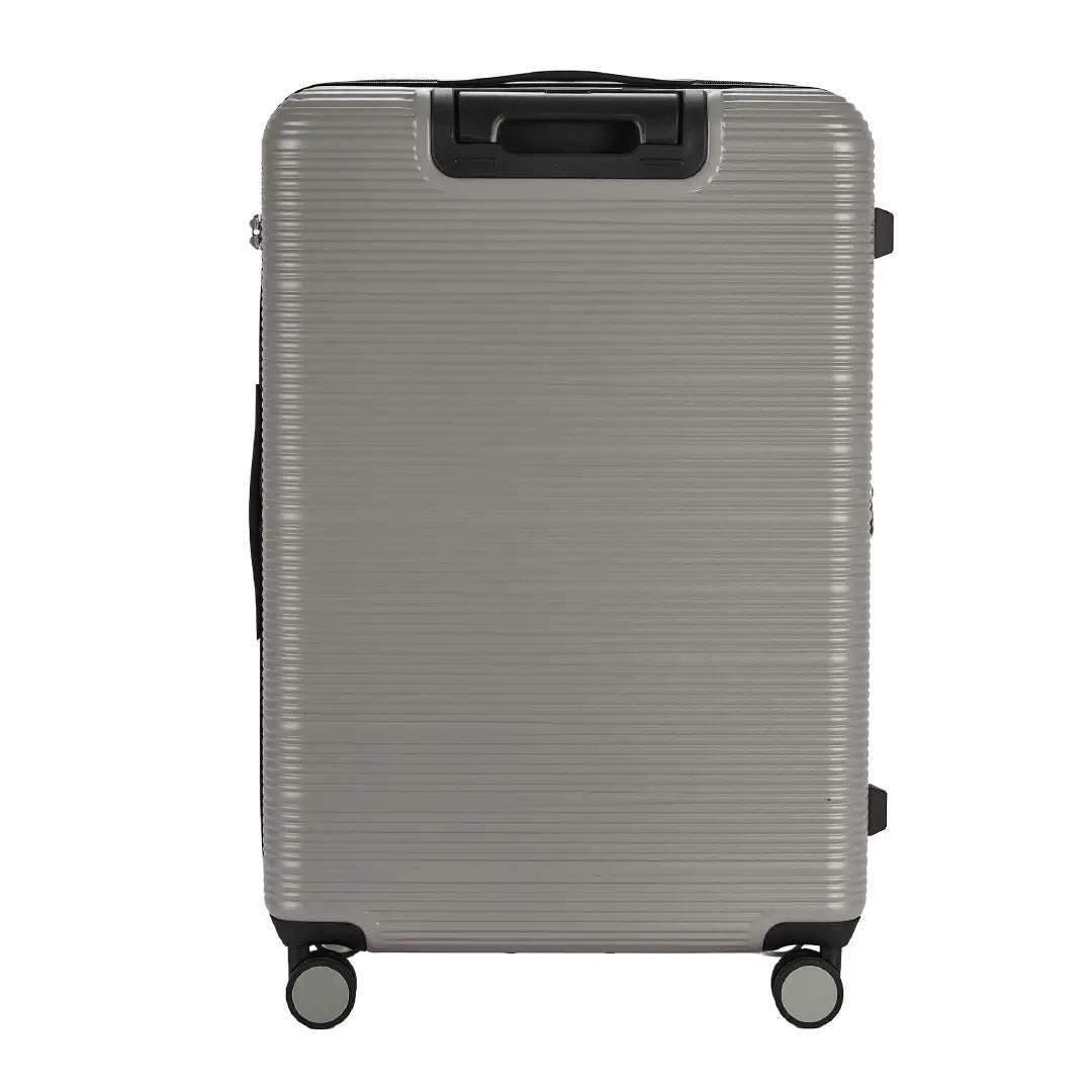 Silver suitcase with black wheels on a white background