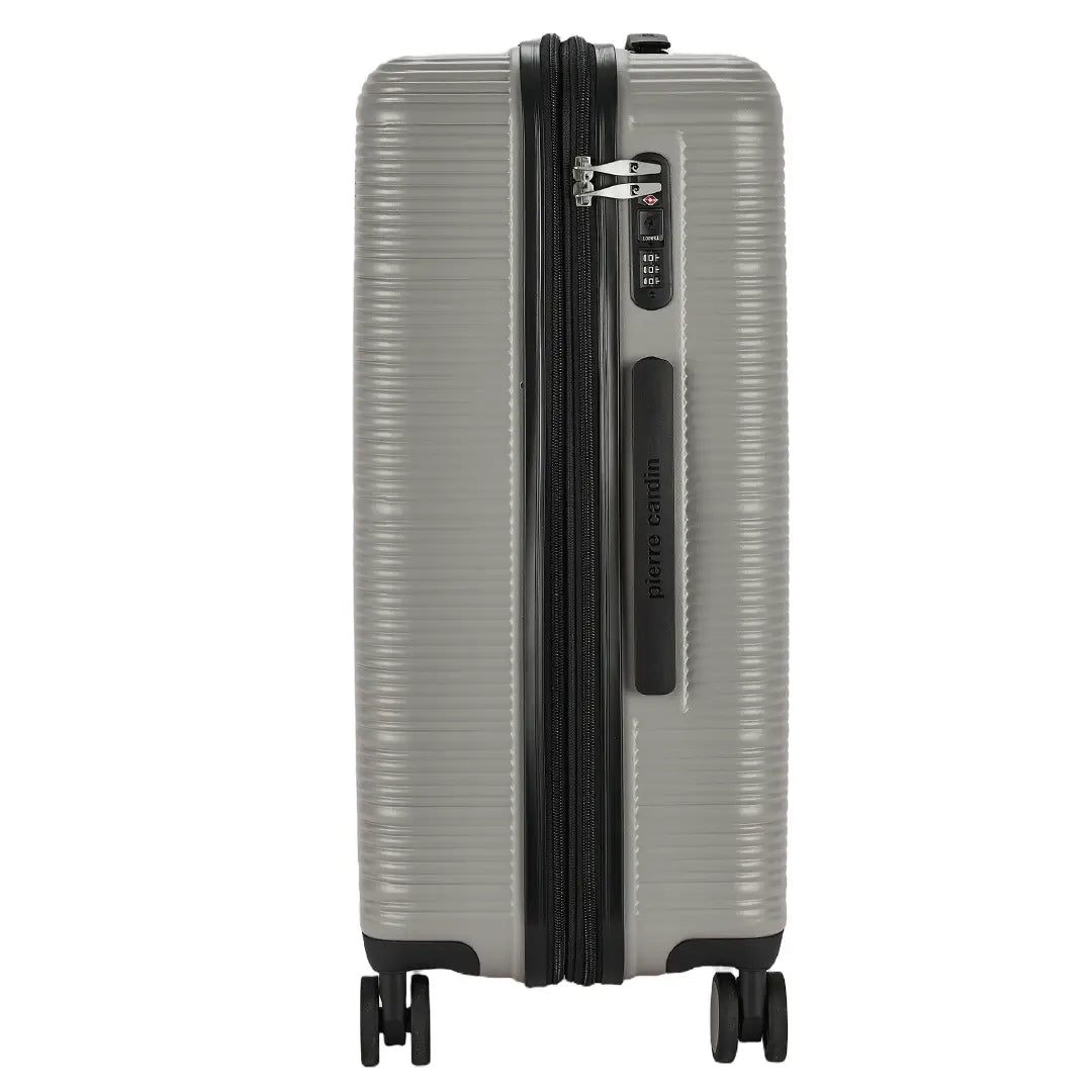Silver suitcase with black handle and wheels on a white background