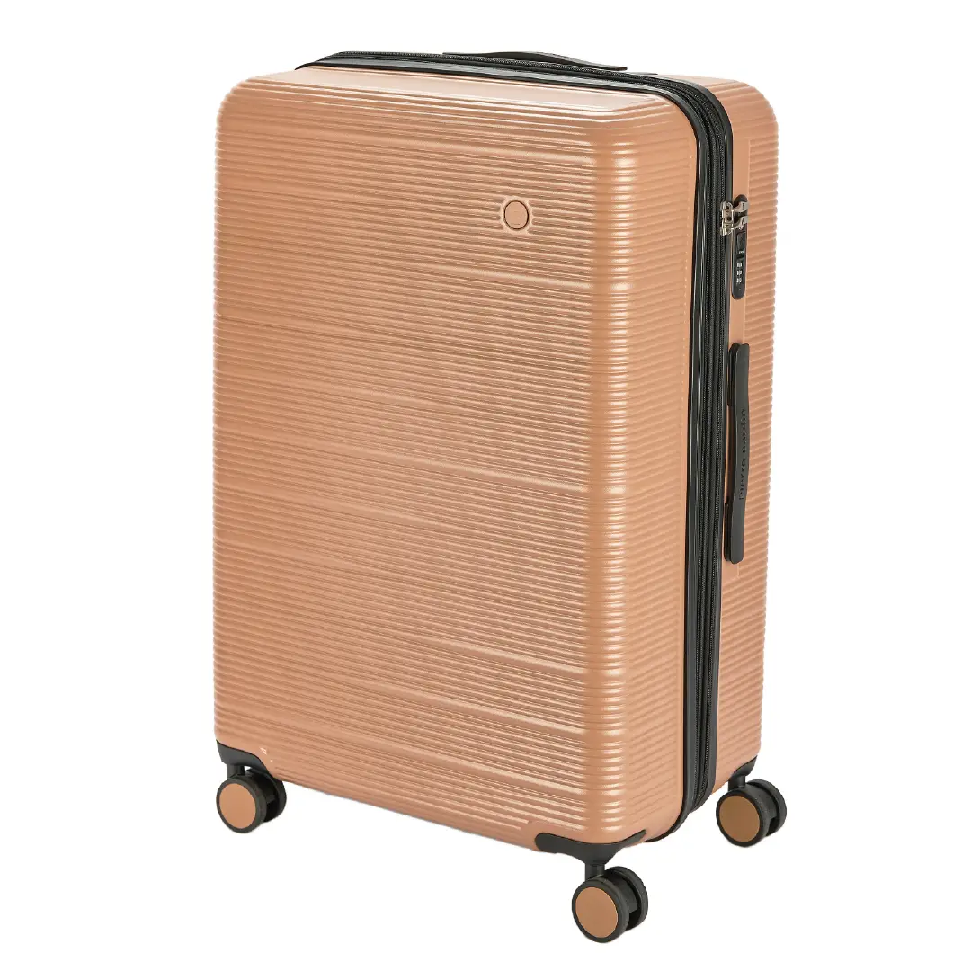 Beige suitcase with black accents on a white background