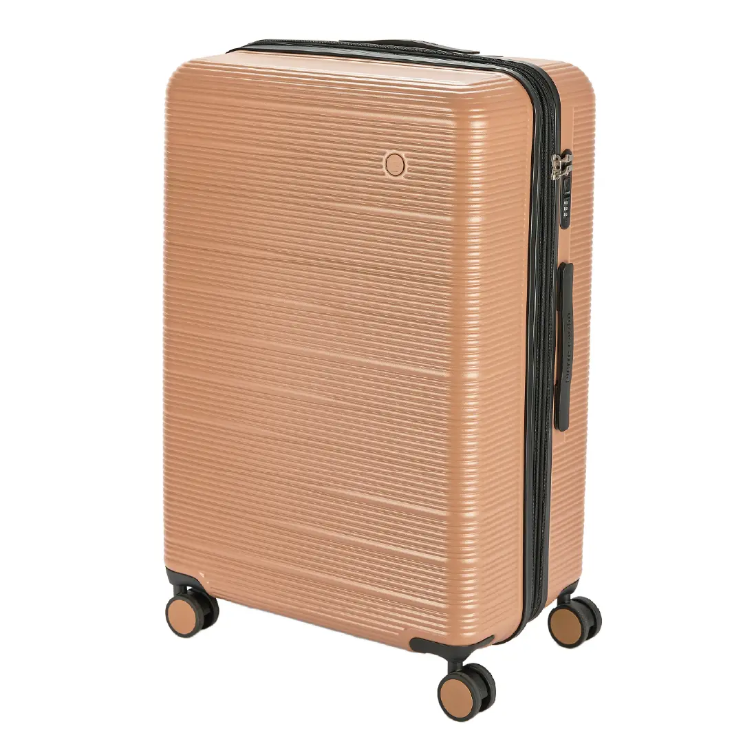Beige suitcase with black accents on a white background