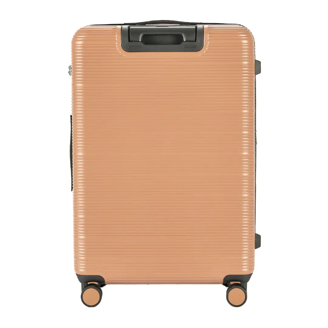 Tan suitcase with a ribbed texture on a white background