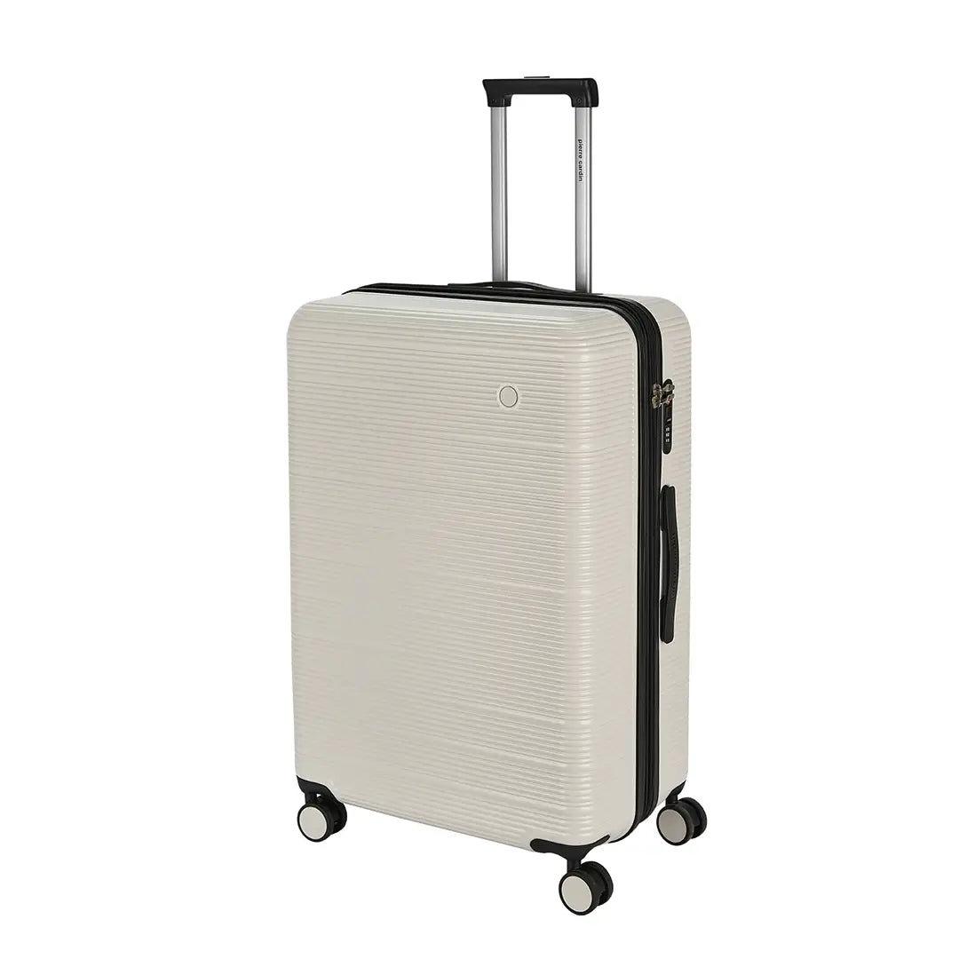Beige suitcase with black handle and wheels on a white background