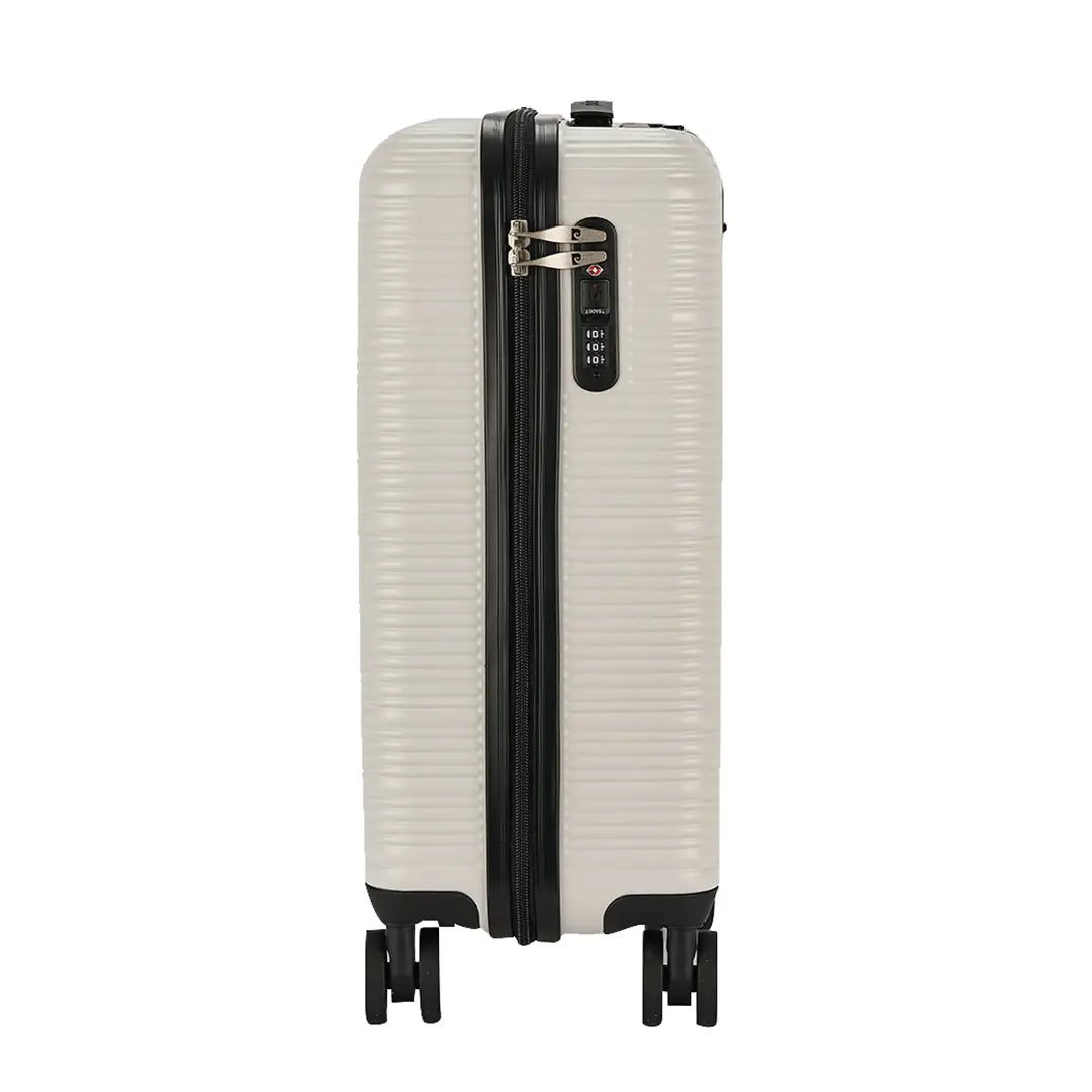 Beige suitcase with black accents on a white background