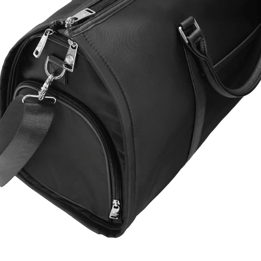 Black duffel bag with zippers on a white background