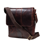 A dark brown distressed leather messenger bag with a wide adjustable canvas shoulder strap, shown on a solid white background.