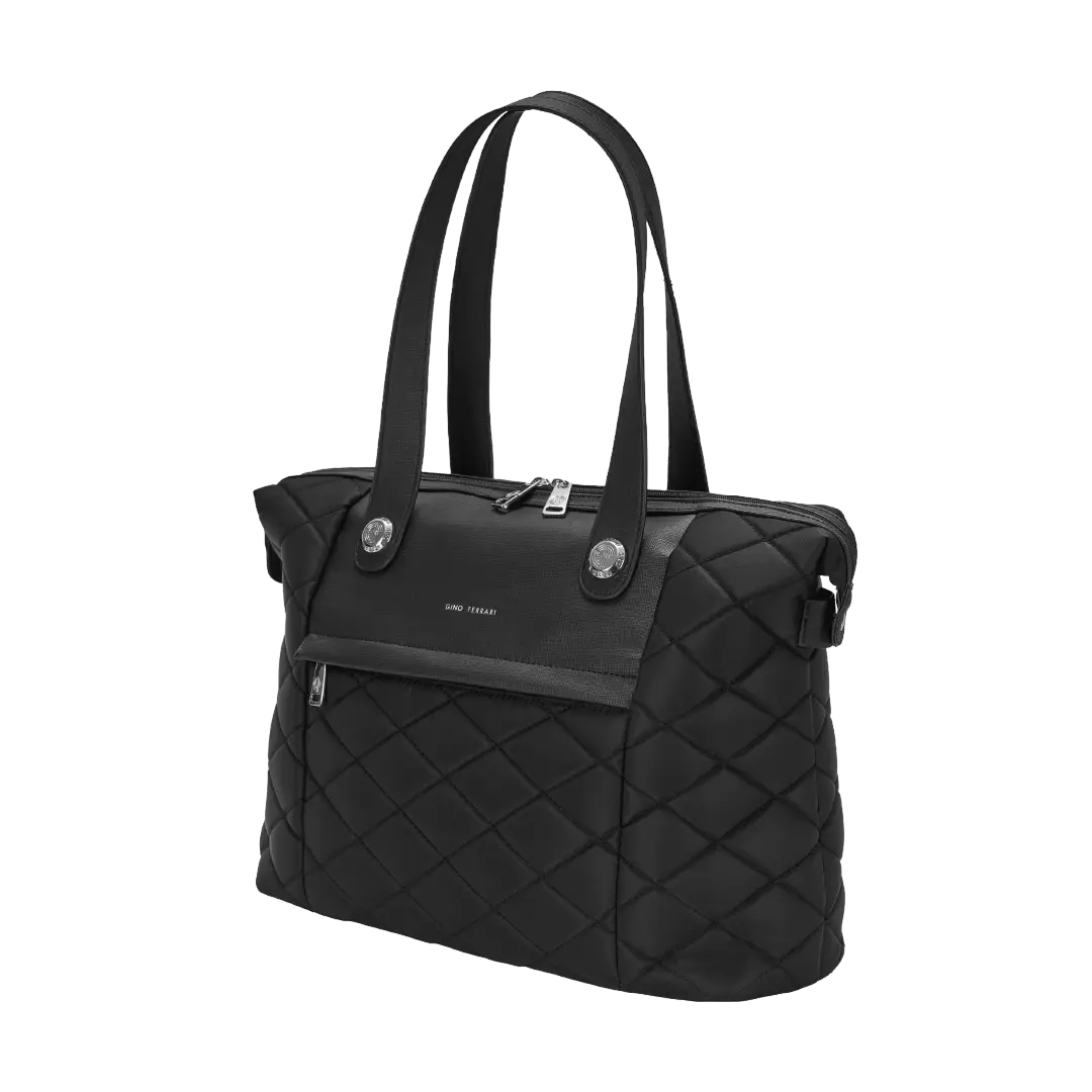 Black quilted handbag on a white background
