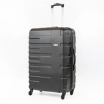 Black suitcase with a textured surface on a white background
