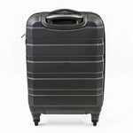 The back of a black cabin-sized suitcase.