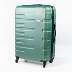 Green suitcase with a textured surface on a white background