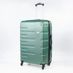 Green suitcase with a textured surface on a white background