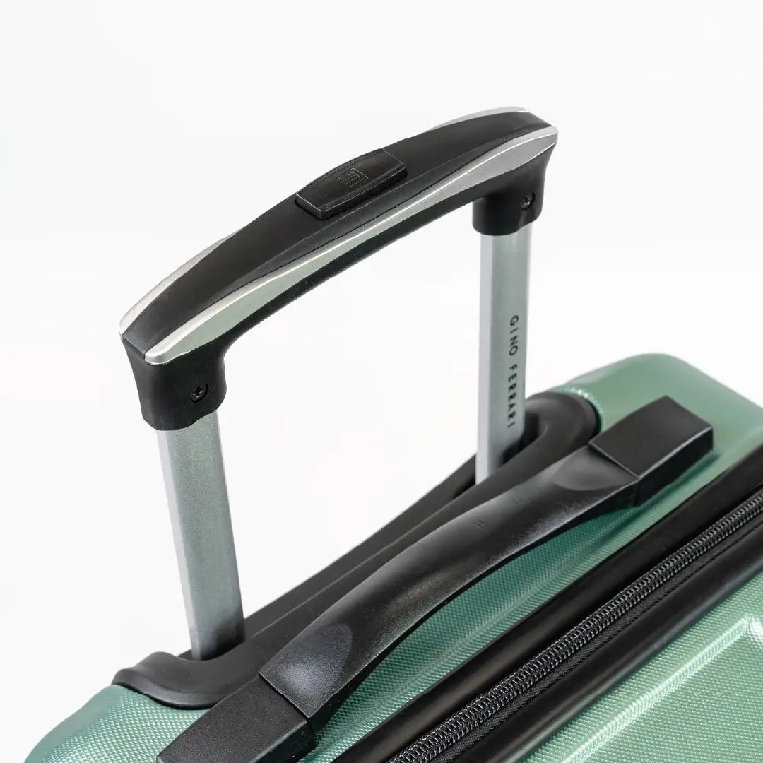 Close-up of a suitcase handle on a white background