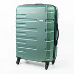 Green suitcase with a textured surface on a white background