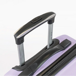 Close-up of a suitcase handle on a white background