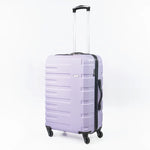 Light purple suitcase with black handle and wheels on a white background