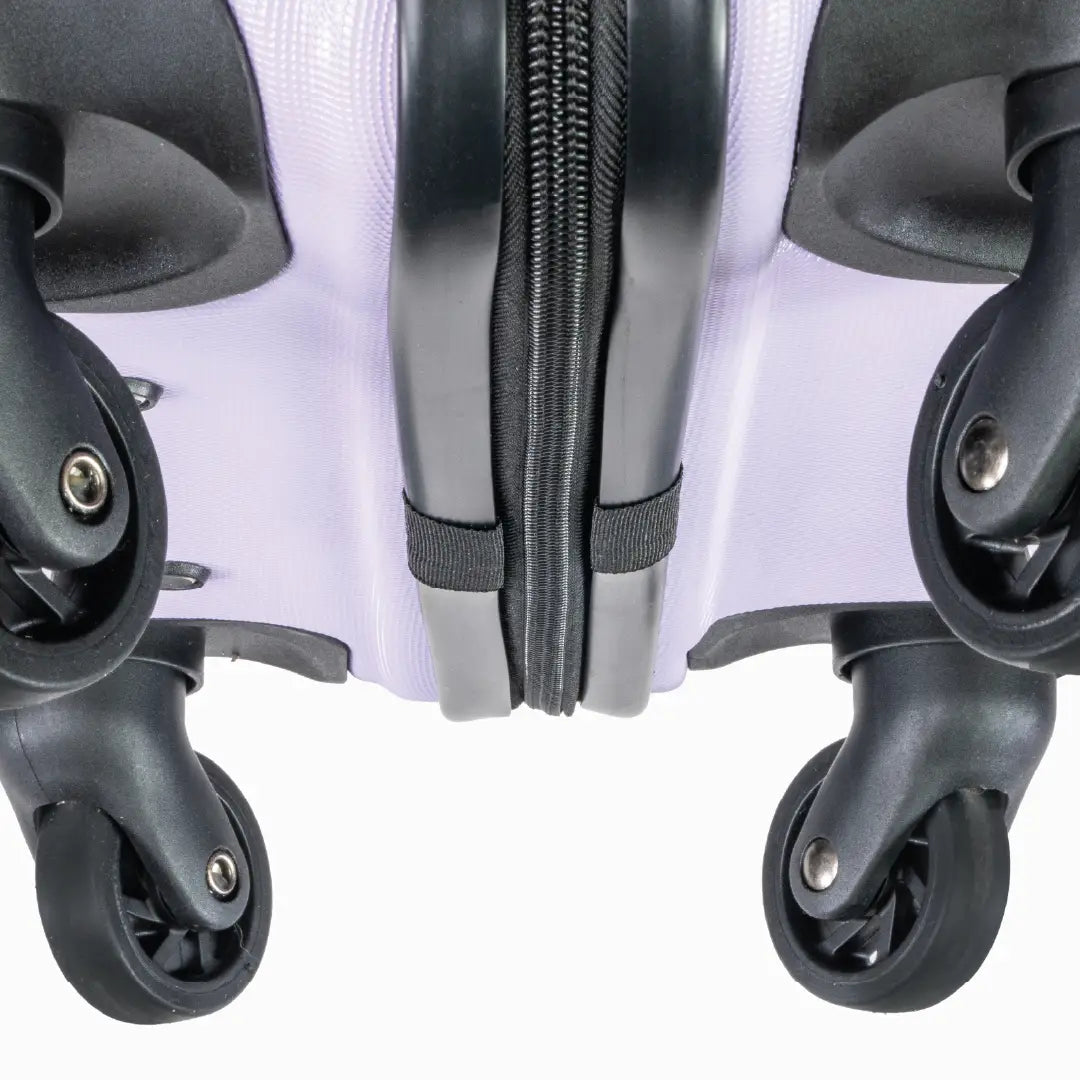 Close-up of a suitcase with wheels and zippers on a white background