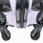 Close-up of a suitcase with wheels and zippers on a white background