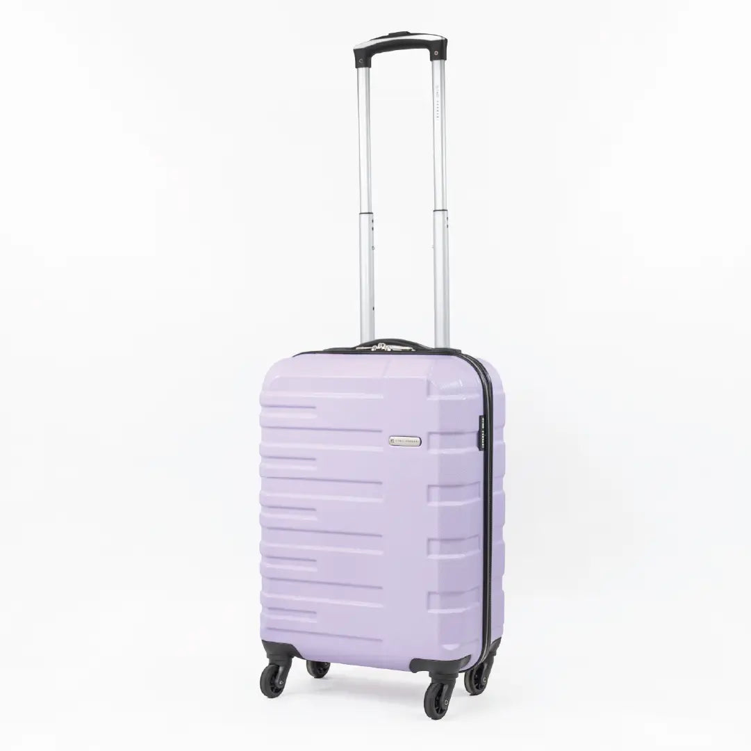 A lavender cabin-sized suitcase with a black handle pulled up and wheels