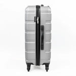 Gray suitcase with black handle and wheels on a white background