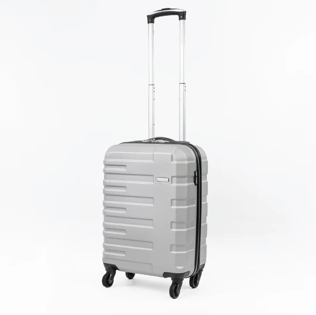 Full view of a silver suitcase with a handle on a white background.