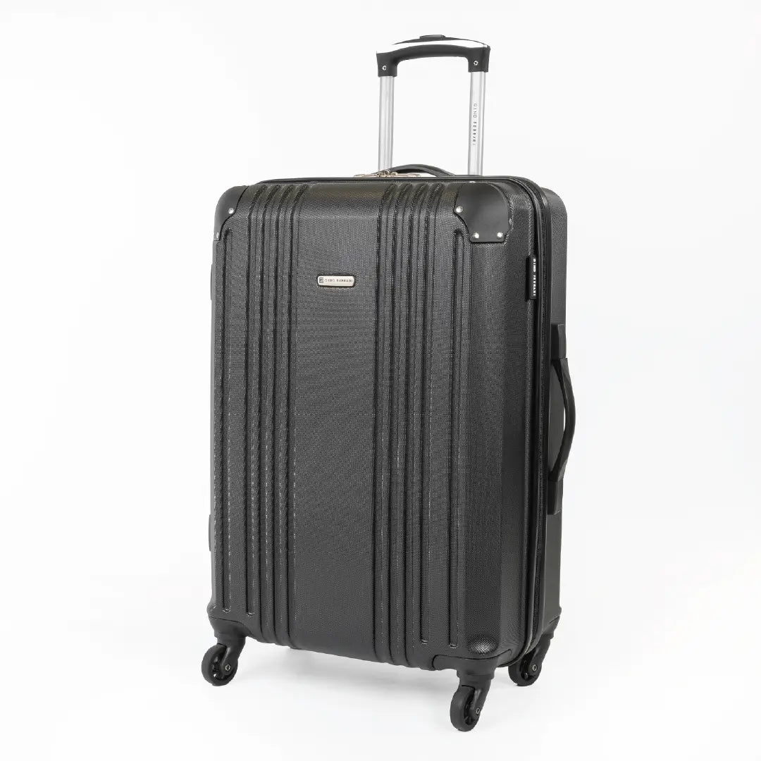 Black hard-shell suitcase with visible brand logo and has the handle up.