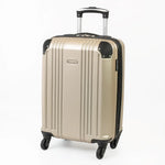 Cabin-sized gold hard-shell suitcase with a visible brand logo and black accents.