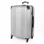 Cabin-sized silver hard-shell suitcase with a visible brand logo and black accents.