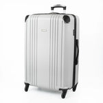 Silver hard-shell suitcase with a visible brand logo and black accents.