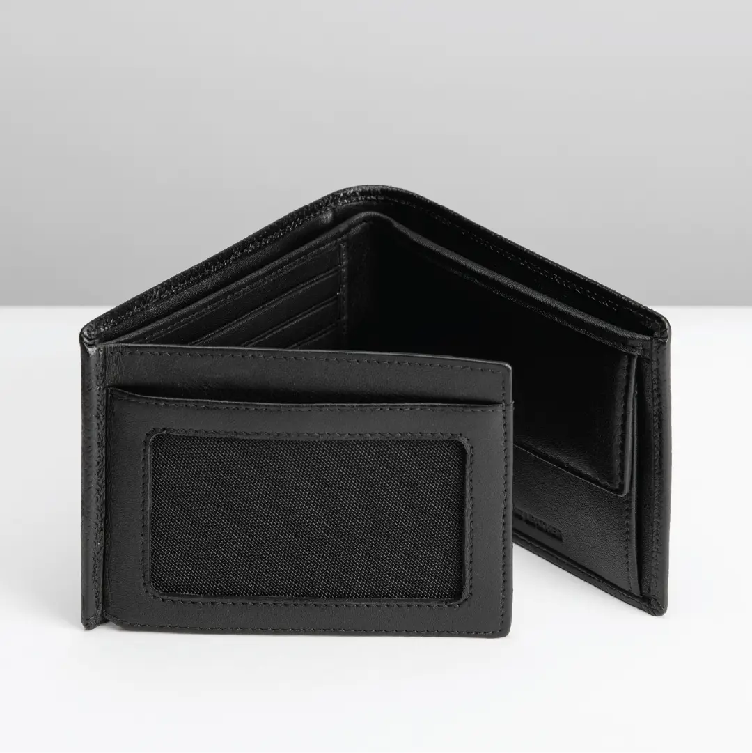 A black leather bi-fold wallet shown open, displaying its interior card slots and ID window, set against a clean light gray background.