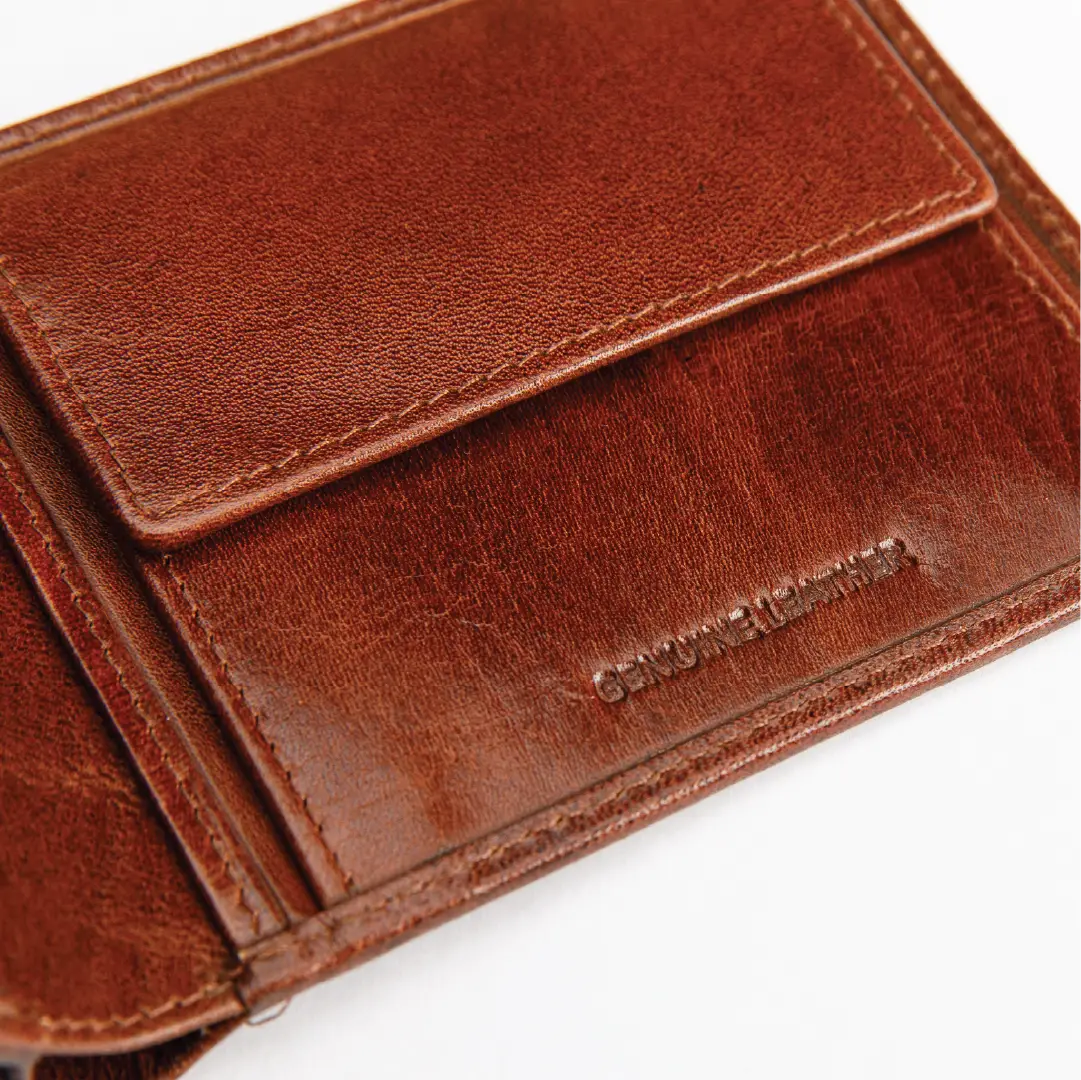 A close-up of a brown leather wallet showing the interior card slots and a debossed brand name that reads 'Genuine Leather'.